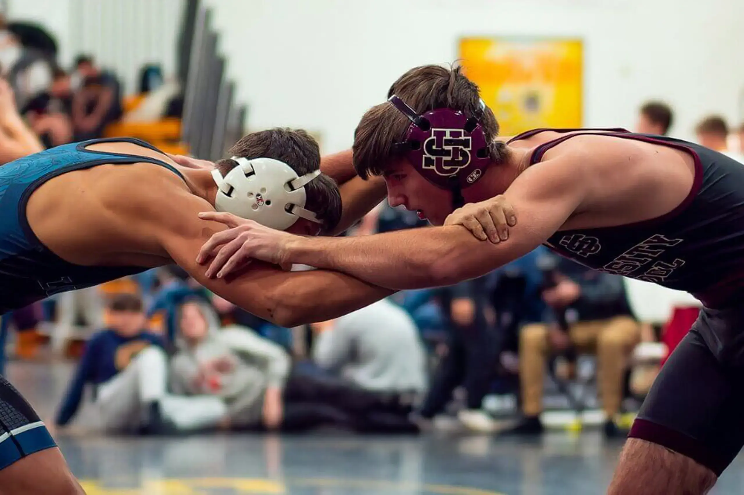 University School student taking part in a wrestling match.