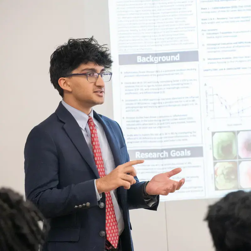 University School student giving a presentation to the class.