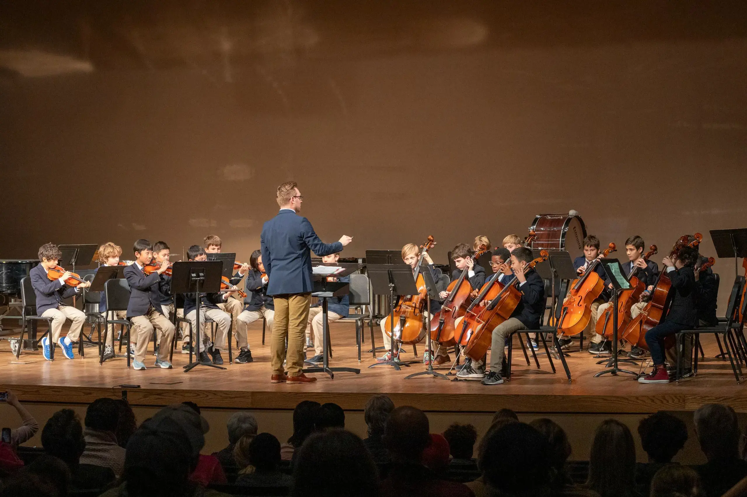 University School Middle School student orchestra performing at a concert.