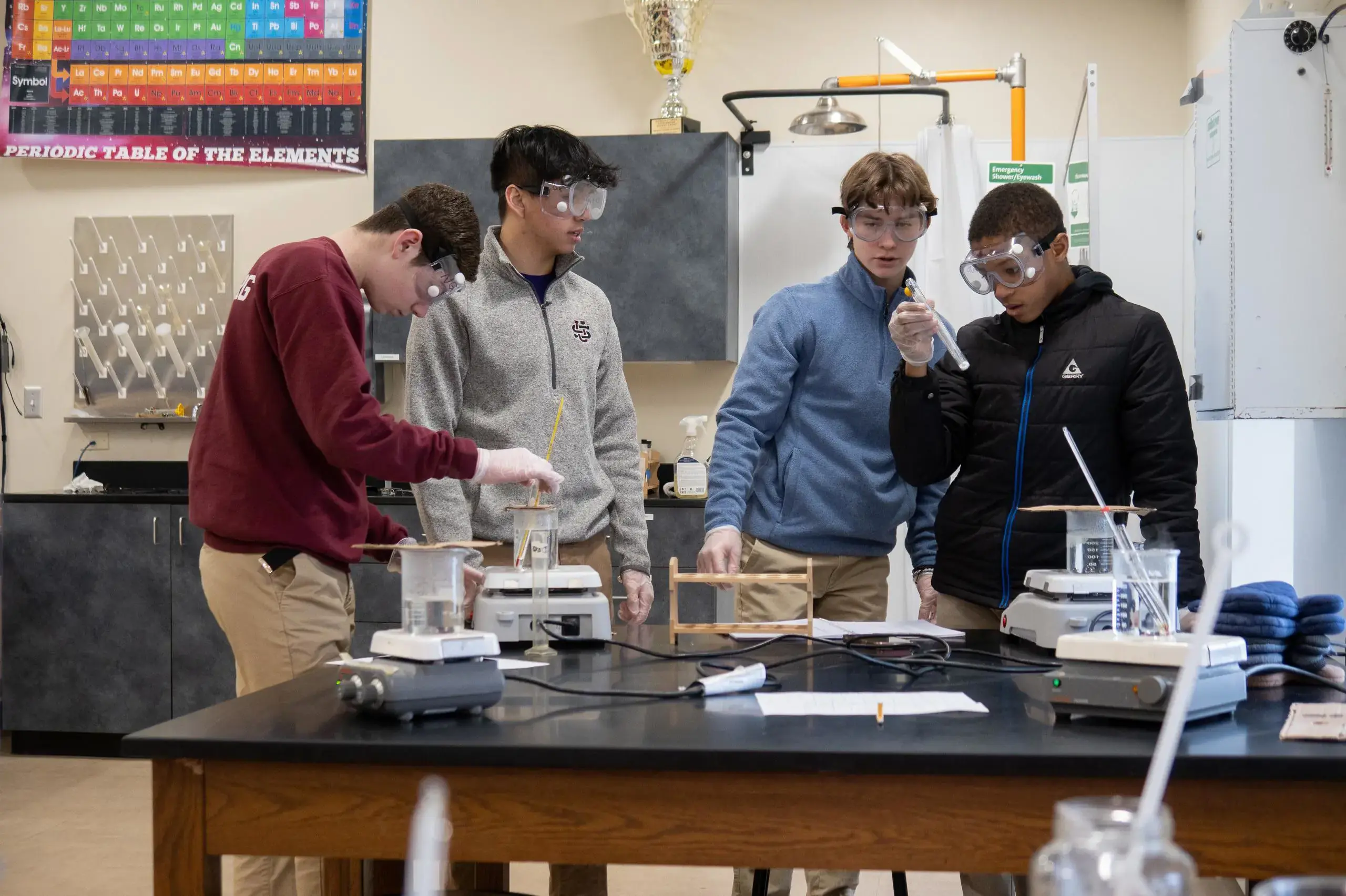 University School Middle School students conducting an experiment in a Science class.
