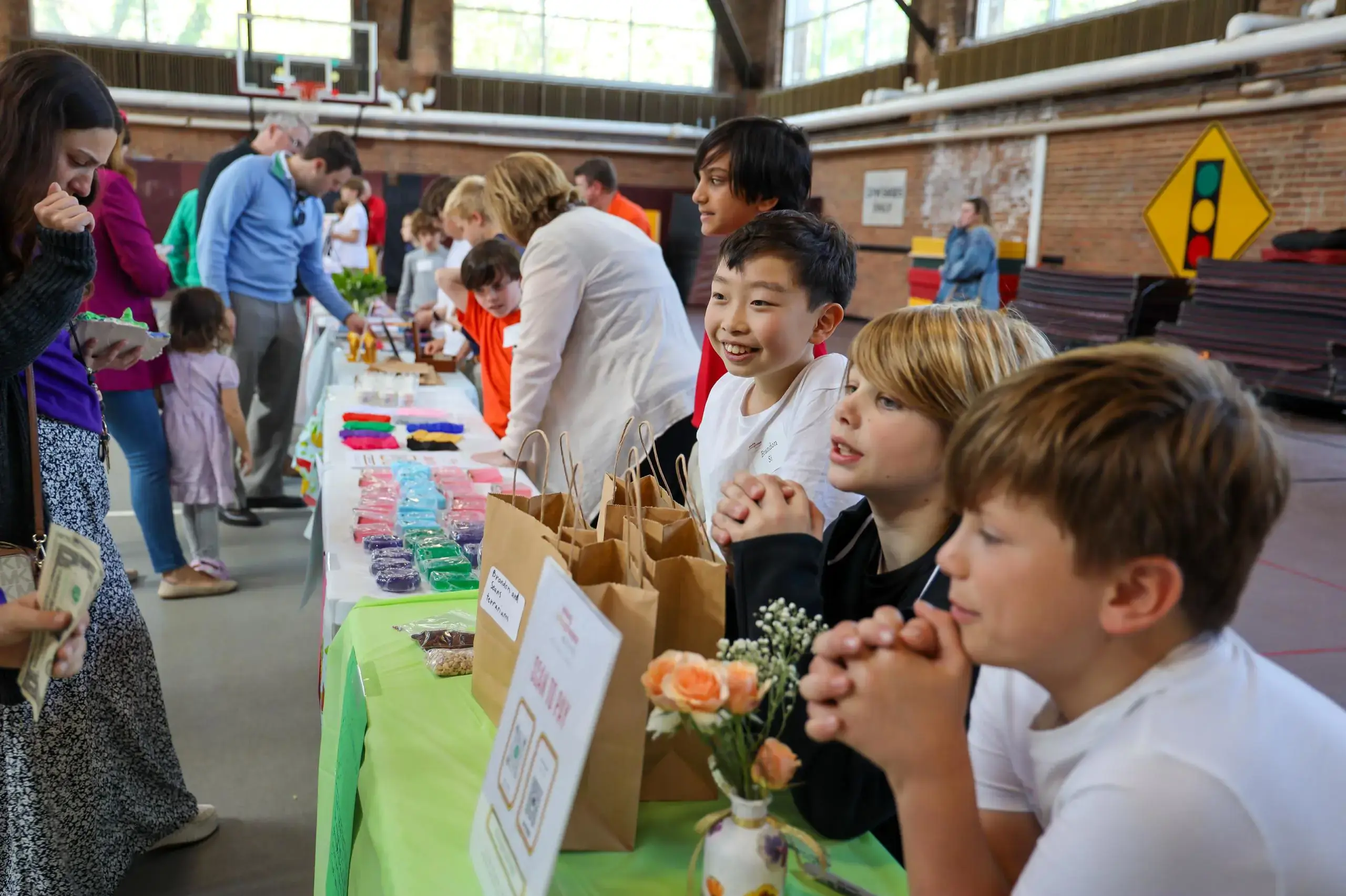University School students running stalls at a student craft fair.