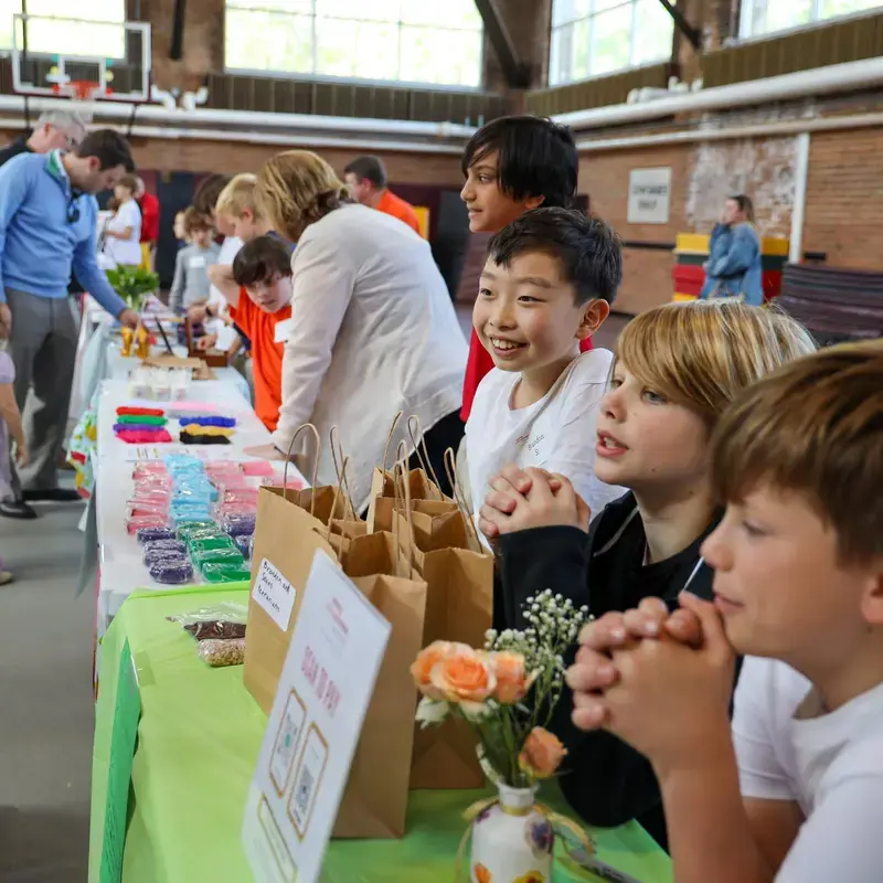 University School students running stalls at a student craft fair.