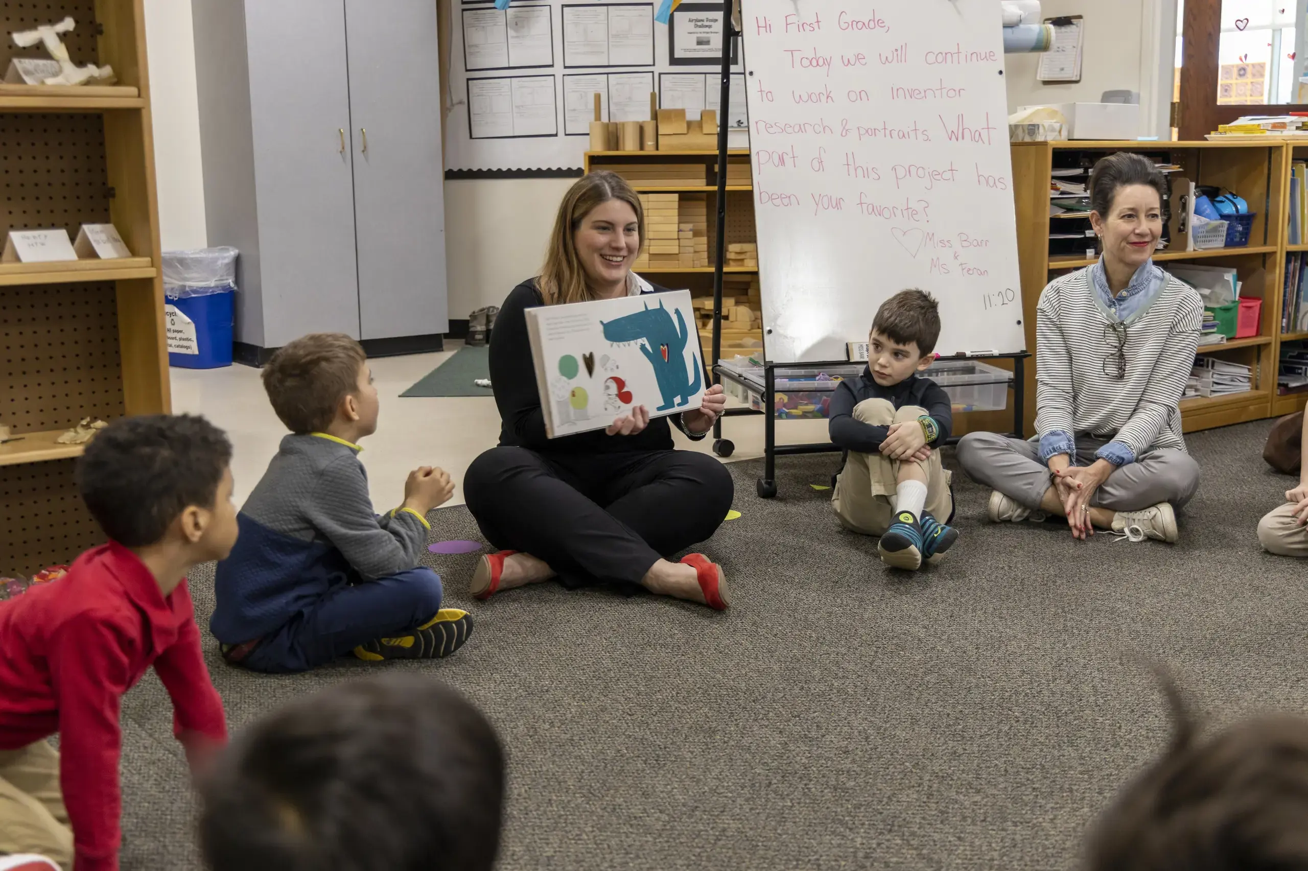 University School teacher reading a story to their class in the Lower School.