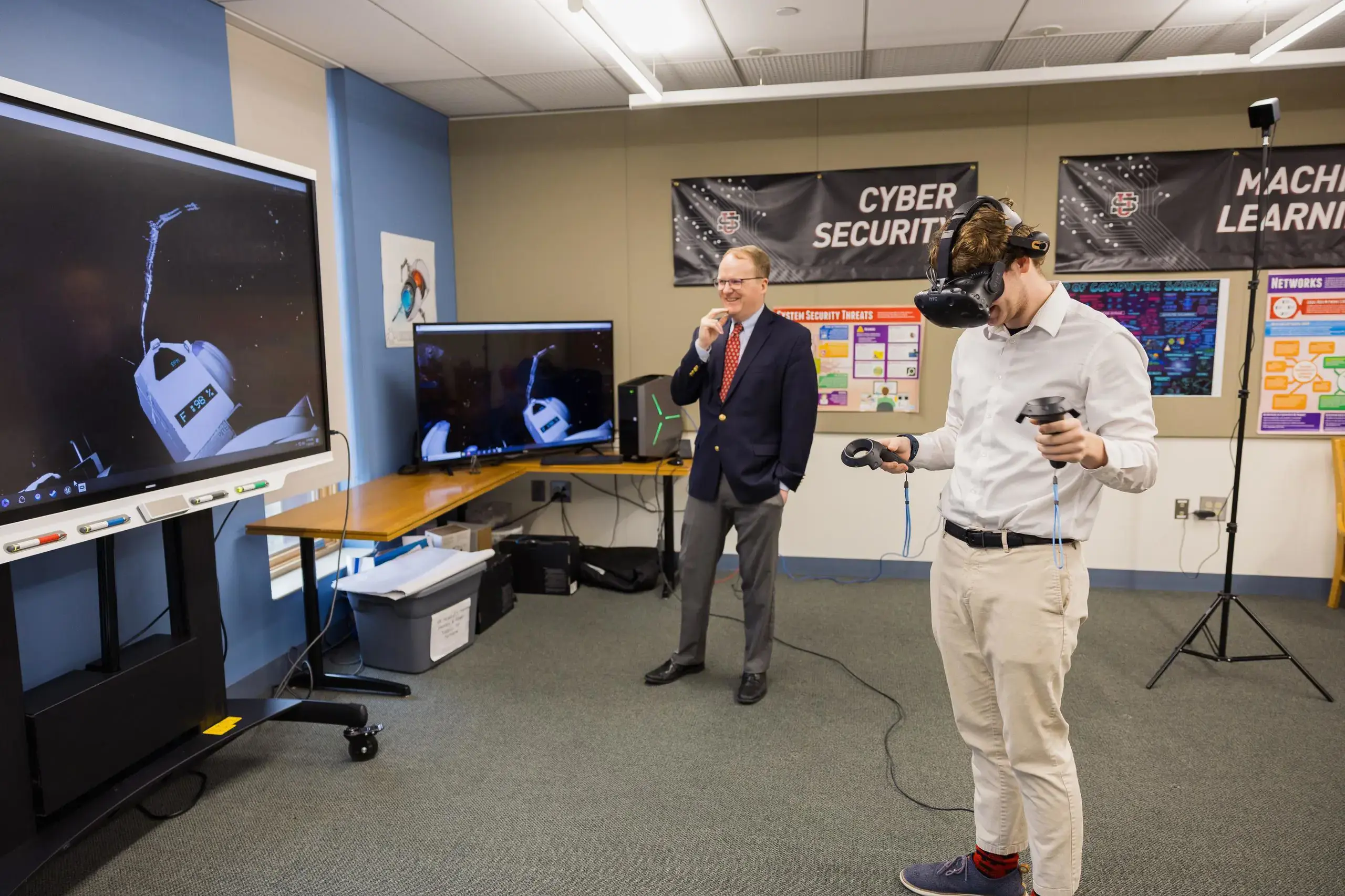 University School upper school student uses a VR headset in a computer science lesson.