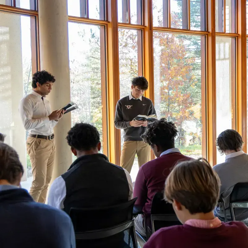 University School Upper School students reading in front of their class in an English lesson.